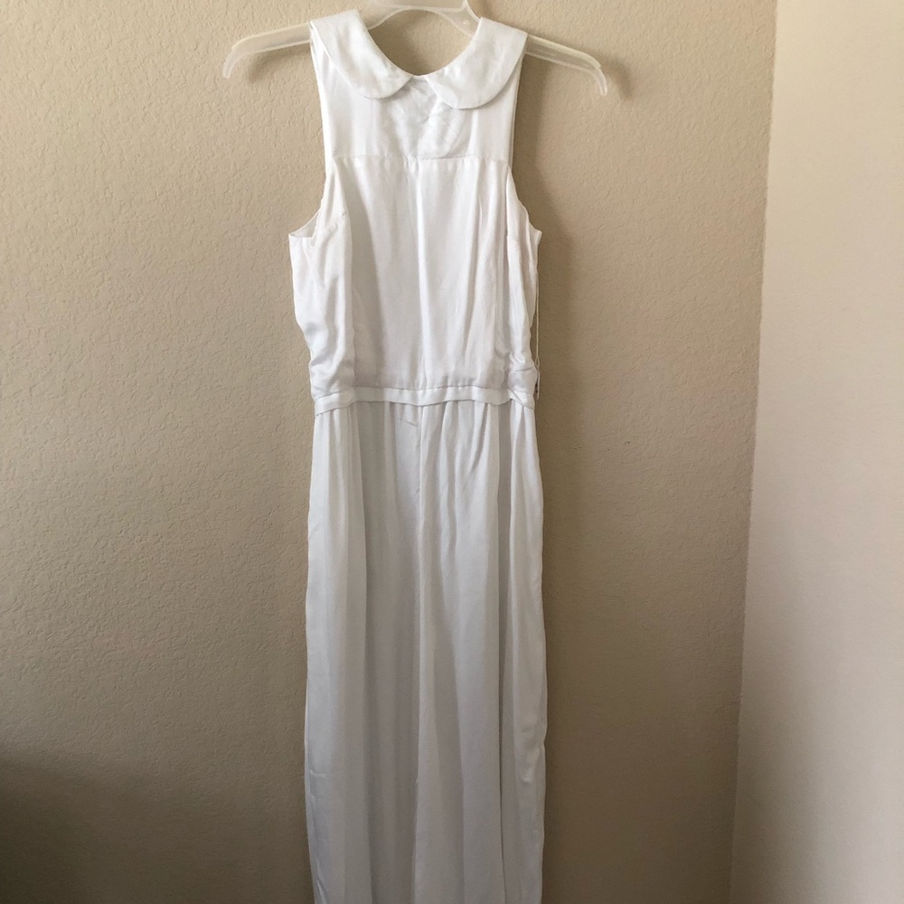 White Peterpan collar jumpsuit.